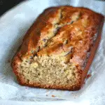 Cottage cheese banana bread no flour sliced on a rustic table